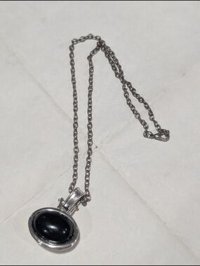 Black Pendant Necklace With Reversible Cream Colored Side